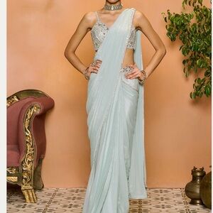 Elegant dusty mint green Saree with Embellished Blouse